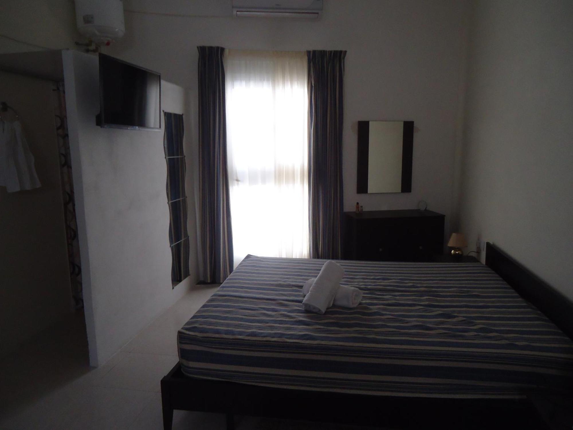 Апартаменти Shamrock Flats Мелліха Номер фото
