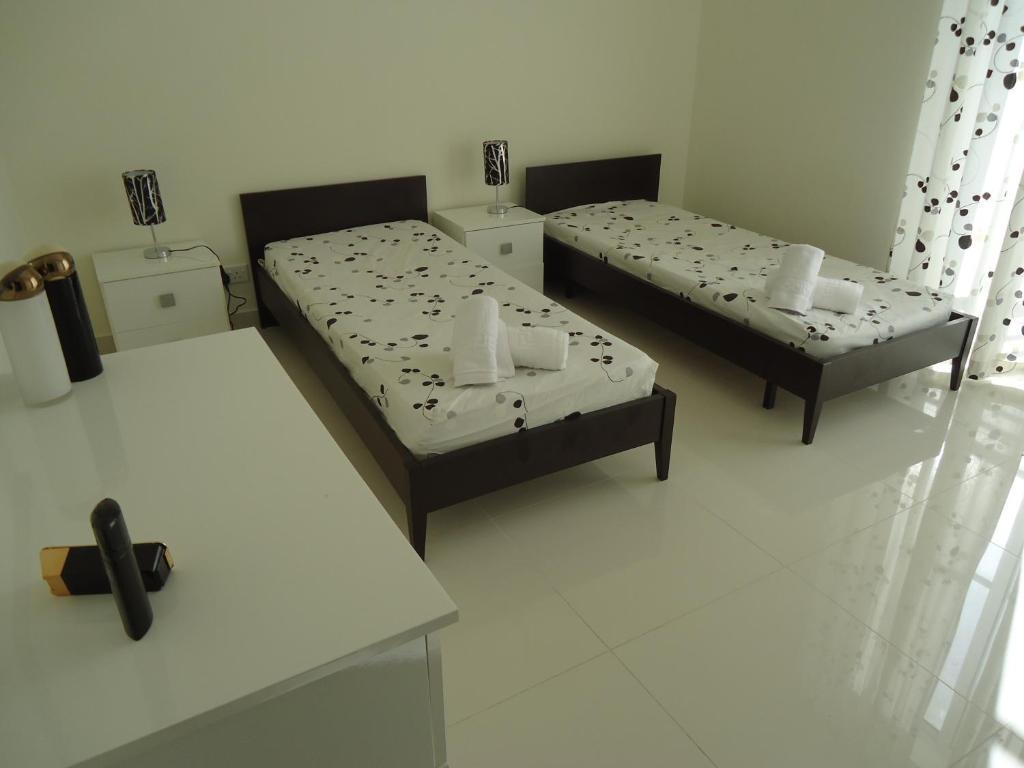 Апартаменти Shamrock Flats Мелліха Номер фото
